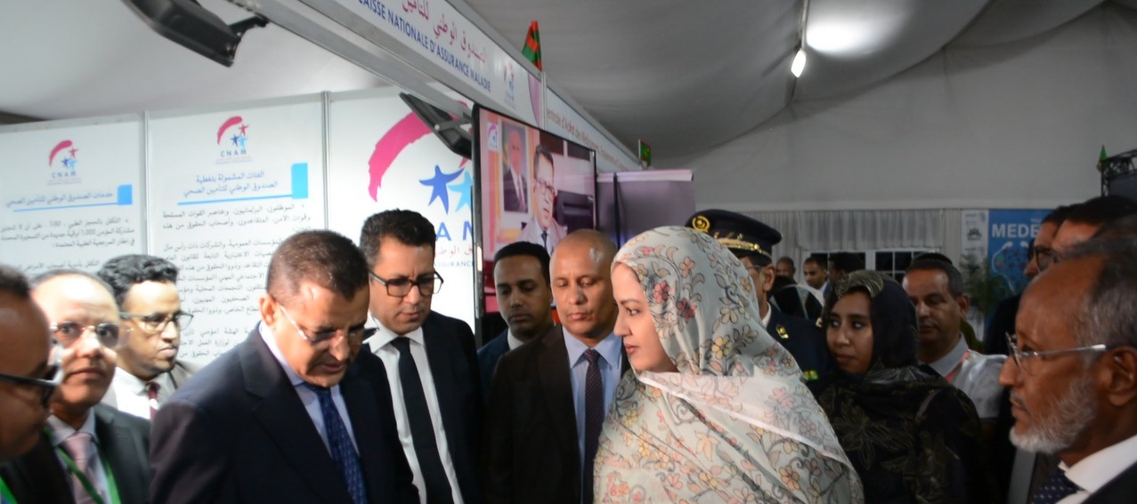 La Première Dame visite le stand de la Caisse Nationale d'Assurance Maladie au salon international de la santé MEDEX 2024-1